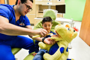 pediatric patient visiting our experienced emergency pediatric dentist in Edinburg, TX
