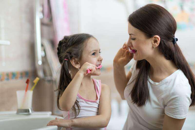 little girl smiling at the pediatric dentist